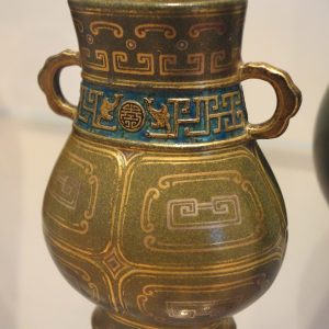 Jingdezhen glazed porcelain vase painted with floral enamel decoration.