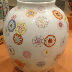 Qing dynasty porcelain vase painted with floral famille rose overglaze enamels.